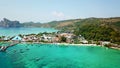 Blue lagoon. Bay with clear sea. Green island with palm trees, Paradise. Drone footage. Royalty Free Stock Photo