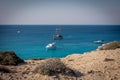 Blue Lagoon, Cape Greco, Cyprus. Small boats anchored at the bay. Royalty Free Stock Photo