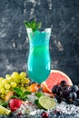 Blue lagoon cocktail with blue curacao liqueur, vodka, lemon juice and soda Royalty Free Stock Photo