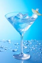 blue lagoon cocktail drink in cocktail glass on blue background Royalty Free Stock Photo