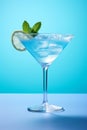 blue lagoon cocktail drink in cocktail glass on blue background Royalty Free Stock Photo
