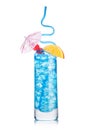 Blue lagoon cocktail highball glass with straw and orange slice with sweet cherry and umbrella on white. Vodka and blue curacao Royalty Free Stock Photo