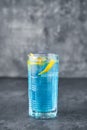 Blue lagoon cocktail  with vodka, blue liquor, ice and lemon Royalty Free Stock Photo