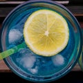 Blue lagoon coctail with lemon