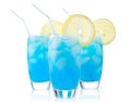 Blue lagoon drinks with slice of lemon with straw isolated on white Royalty Free Stock Photo