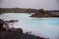 The Blue Lagoon geothermal spa and lava rocks in Iceland. Royalty Free Stock Photo