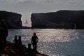 Blue Lagoon Malta - Silhouetted Sailing Yacht Passing Royalty Free Stock Photo