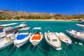 Blue lagoon of Marathi bay with fishing boats