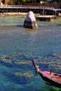 Blue lagoon stone in thailand kho tao bay abstract of a pier b Royalty Free Stock Photo