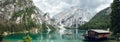 Blue lake and mountains in Lago di Braies, Dolomites Alps, Italy Royalty Free Stock Photo