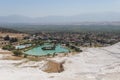 Blue lake near the travertines of Pamukkale in Turkey. Travel in Turkey. Royalty Free Stock Photo