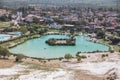 Blue lake near the travertines of Pamukkale in Turkey. Travel in Turkey. Royalty Free Stock Photo