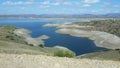 Blue lake with patterned shores