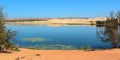 Blue lake with sand hills in Phan Thiet, Vietnam Royalty Free Stock Photo