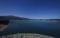Blue Lake and Sky at a Dam Royalty Free Stock Photo