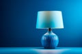 Blue lamp with white shade on blue background. Generative AI Royalty Free Stock Photo