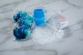 Blue laundry detergent sorts variety in powder, liquid gel and pod in washing dose