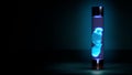 Blue lava lamp on right on dark background with free space - abstract 3D illustration