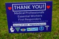 A blue lawn sign giving thanks to medical professionals for their service during the pandemic