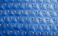 Blue leather texture with metal elements
