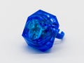 Blue LED plastic diamond ring toy isolated on white Royalty Free Stock Photo