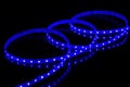 Blue LED strip tape on black background Royalty Free Stock Photo