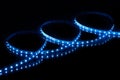 Blue LED strip tape on black background