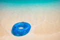 Blue Life Buoy on the White Beach Royalty Free Stock Photo