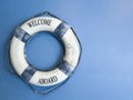 Blue Lifebuoy decorate on blue wall. Royalty Free Stock Photo