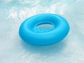 Blue lifebuoy in pool