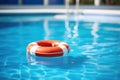blue lifesaver buoy floating in a swimming pool Royalty Free Stock Photo