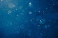 Blue light background with snowflakes particles Royalty Free Stock Photo