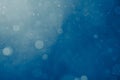 Blue light background with snowflakes particles Royalty Free Stock Photo