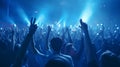 Blue light blinks to the audience at the concert or festival, followed by everyone putting their hands up and following the beat,