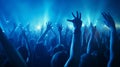 Blue light blinks to the audience at the concert or festival, followed by everyone putting their hands up and following the beat,