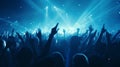 Blue light blinks to the audience at the concert or festival, followed by everyone putting their hands up and following the beat,