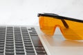 Blue light blockers has data reflected on the lenses Royalty Free Stock Photo