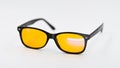 Blue light blocking glasses with yellow lenses Royalty Free Stock Photo