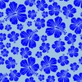 Blue on light blue random hibiscus flower pattern seamless repeat background Royalty Free Stock Photo
