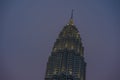 Blue light hour beautiful view of the stunning Petronas Towers right after sunset isolated on a pinky cobalt sky Royalty Free Stock Photo