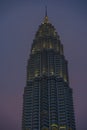 Blue light hour beautiful view of the stunning Petronas Towers right after sunset isolated on a pinky cobalt sky Royalty Free Stock Photo