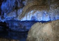 Blue light inside a cave Royalty Free Stock Photo