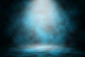 Blue light smoke spotlight stage background. Royalty Free Stock Photo