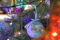 A blue and lilac ball on a Christmas tree. We celebrate New Years Eve. card. Background. Royalty Free Stock Photo