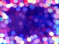 Blue lilac bokeh defocused background. Frame of shiny colored confetti, blurred backdrop Royalty Free Stock Photo