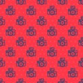 Blue line Photo camera with lighting flash icon isolated seamless pattern on red background. Foto camera. Digital Royalty Free Stock Photo