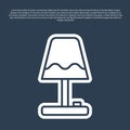 Blue line Table lamp icon isolated on blue background. Vector