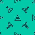 Blue line Traditional indian teepee or wigwam icon isolated seamless pattern on green background. Indian tent. Vector Royalty Free Stock Photo