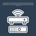 Blue line Wireless multimedia and TV box receiver and player with remote controller icon isolated on blue background Royalty Free Stock Photo