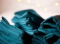Blue linen cloth napkins close up of big stack